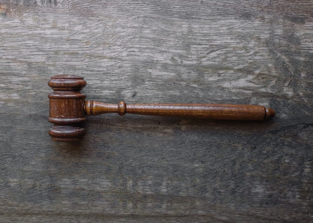 brown mallet on gray wooden surface