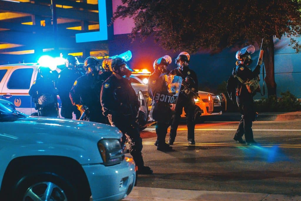 group of police in the middle of the road