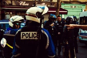man in blue and white jacket wearing white helmet